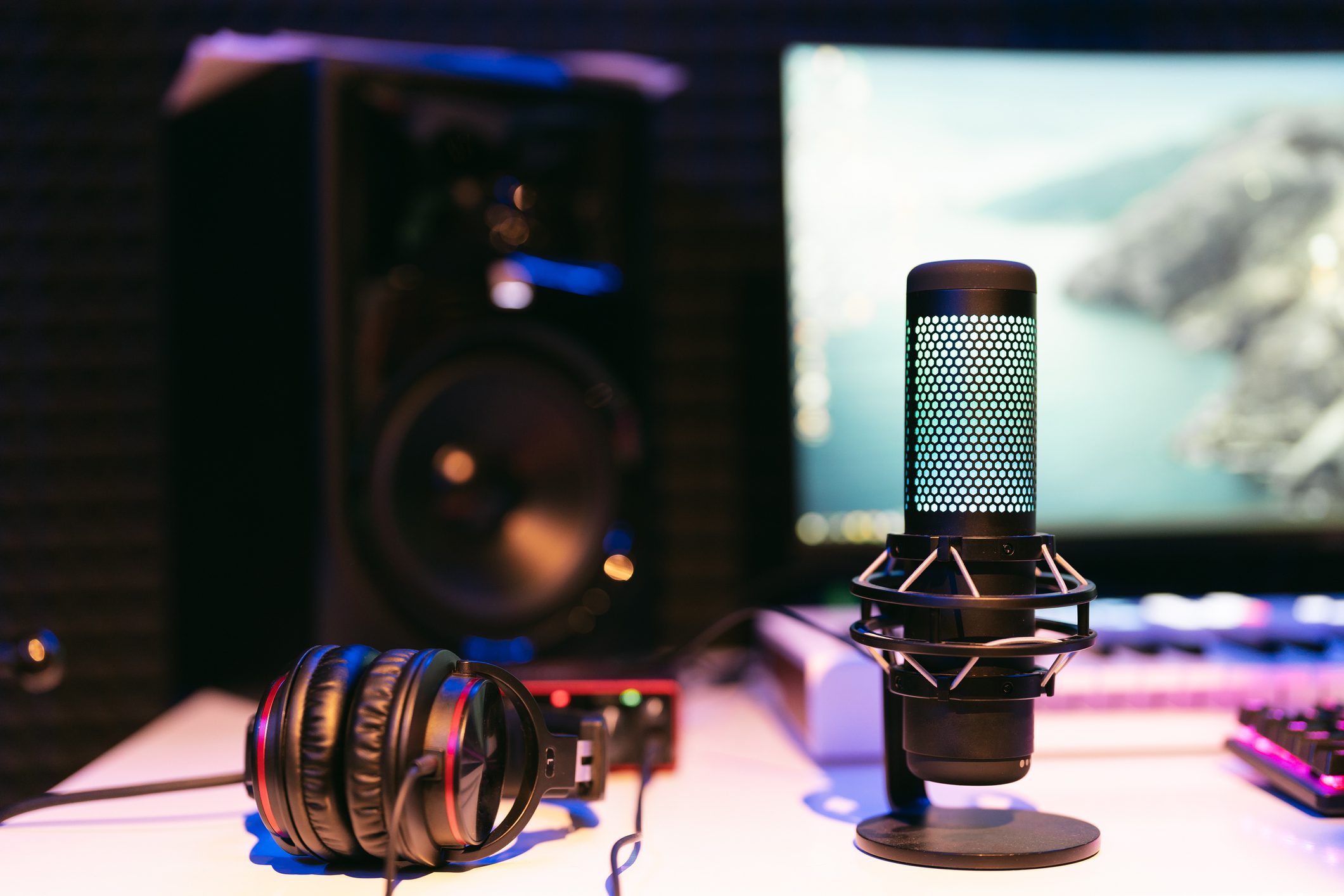 Microphone on studio blurred colorful background